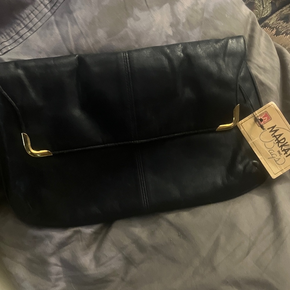 Sophisticated Black Leather Clutch with Gold Accents